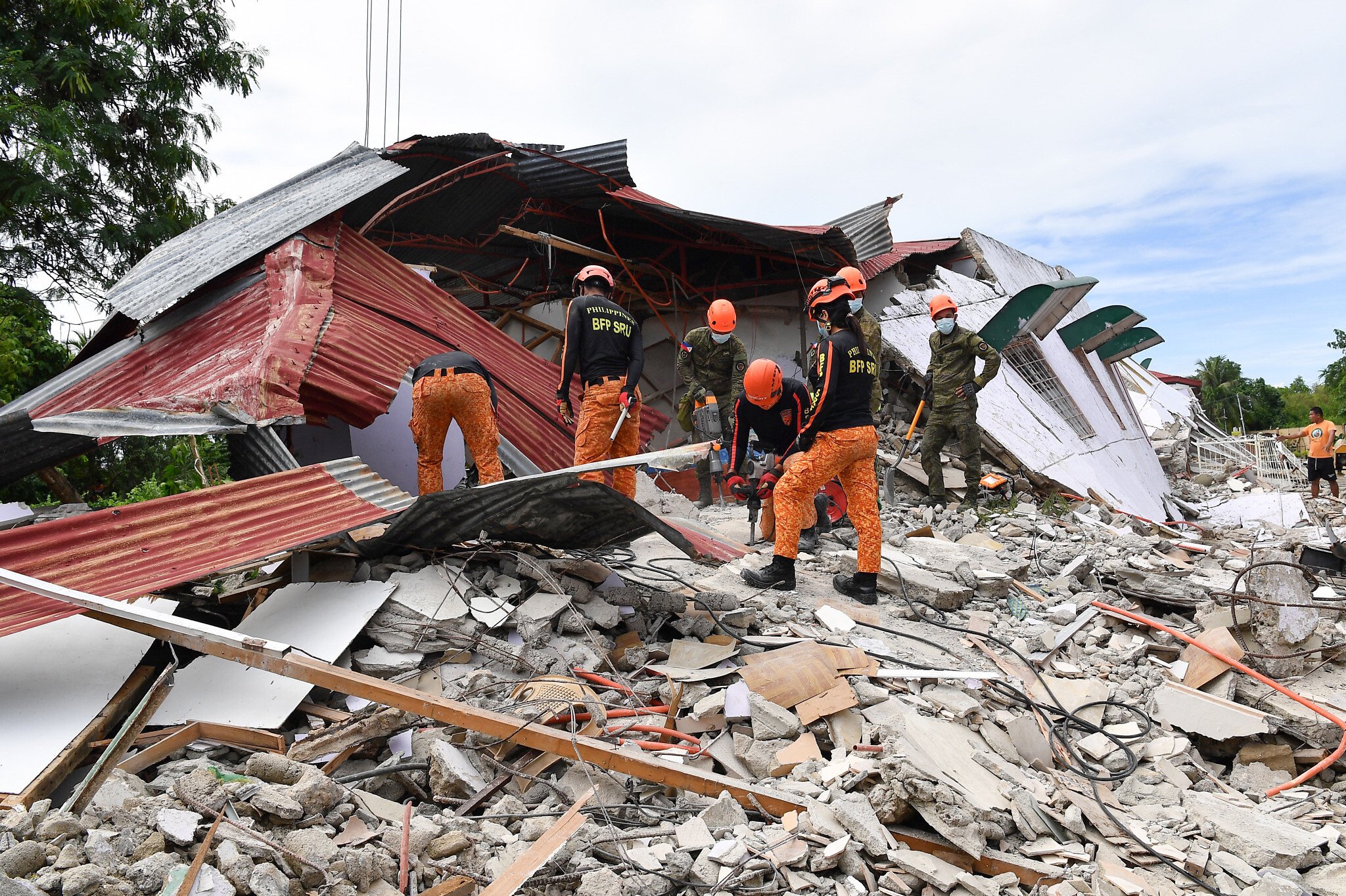 NextImg:At least 69 dead in Philippines earthquake as many more trapped, missing