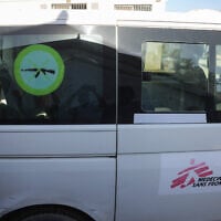 Palestinians transport the body of a member of the Doctors Without Borders (MSF) - France medical NGO, who was killed in an Israeli strike in Deir al-Balah, into Al-Aqsa Martyrs Hospital in the central Gaza Strip on October 2, 2025. (Bashar Taleb/AFP)