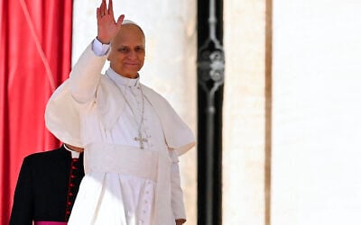 Pope Leo XIV gestures as he attends the Jubilee Mass for the Missionary World and Migrants at St Peter's Square in The Vatican on October 4, 2025. (Andreas SOLARO / AFP)
