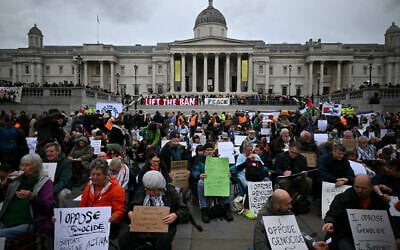 Protesters attend a "Lift The Ban" demonstration in support of the proscribed group Palestine Action, calling for the recently imposed ban to be lifted, in Trafalgar Square, central London, on October 4, 2025. (Justin Tallis/AFP)