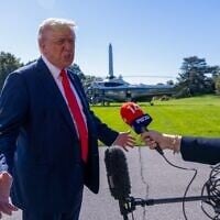 US President Donald Trump talks to the media before heading to Marine One on the south lawn of the White House on October 5, 2025 in Washington, DC. (TASOS KATOPODIS / GETTY IMAGES NORTH AMERICA / Getty Images via AFP)