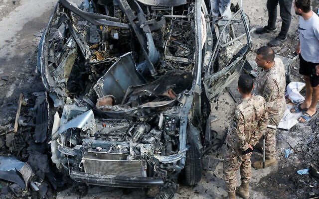 Lebanese security forces inspect a car targeted in an Israeli drone attack in the southern Lebanese village of Zebdine, on October 6, 2025. (Mahmoud Zayyat/AFP) Lebanese security forces inspect a car targeted in an Israeli drone attack in the southern Lebanese village of Zebdine, on October 6, 2025. (Mahmoud Zayyat/AFP)