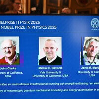 Photos of (L-R) British physicist John Clarke at the University of California, USA, French physicist Michel Devoret (University of California and Yale) and US physicist John Martinis (University of California) are seen on a screen during a press conference on the awarding of the 2025 Nobel Prize in Physics at the Royal Swedish Academy of Sciences in Stockholm, Sweden, on October 7, 2025. (Jonathan Nackstrand / AFP)