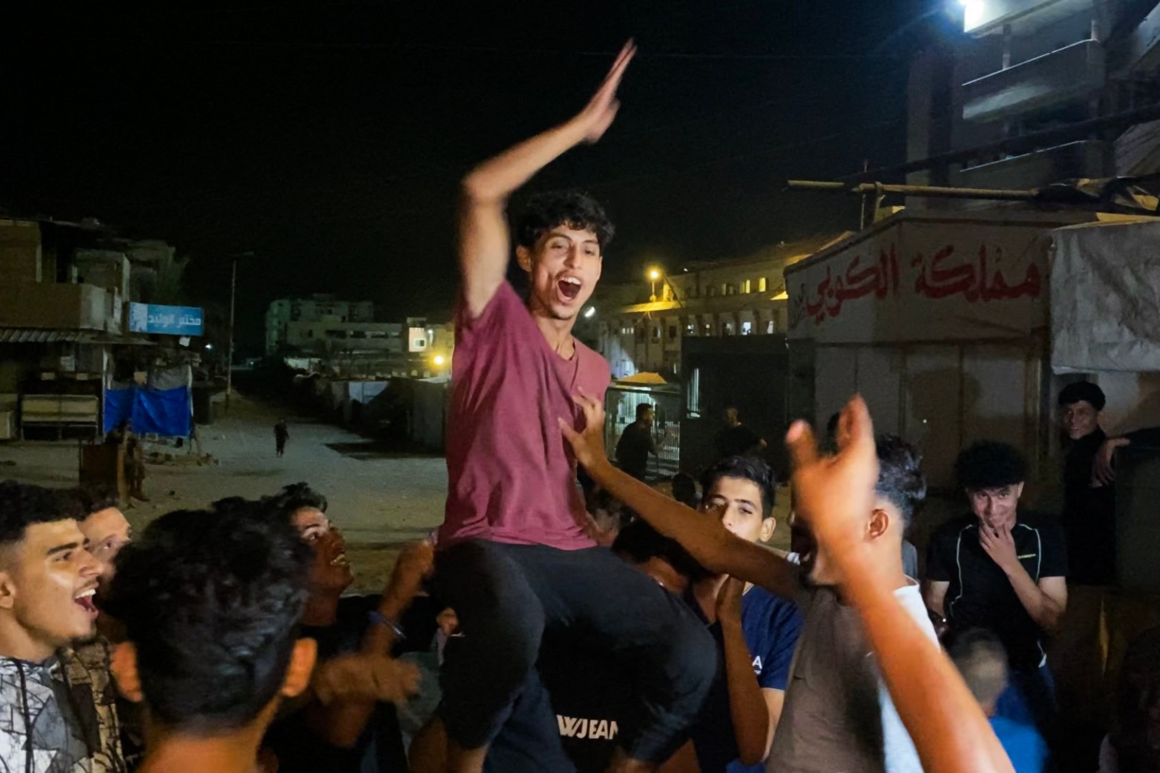 NextImg:Gazans cheer news of ceasefire deal as Hamas calls it ‘fruits of tremendous sacrifice’
