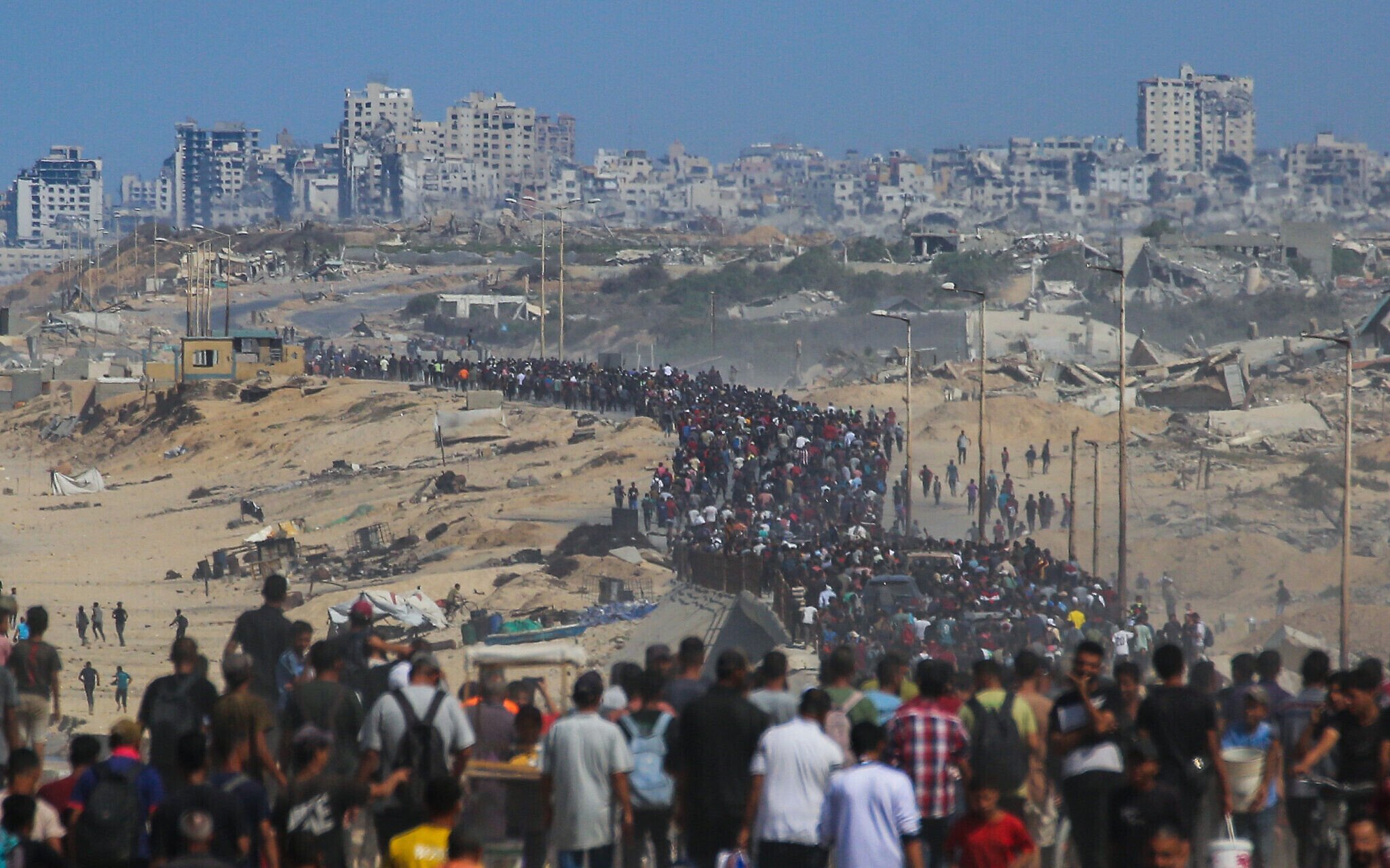 NextImg:Masses begin returning to Gaza City as IDF withdraws, opens coastal road