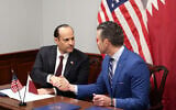 US Defense Secretary Pete Hegseth (R) and Qatari Defense Minister Sheikh Saoud bin Abdulrahman Al Thani shake hands after signing a letter of acceptance to establish a Qatari Emiri Air Force training facility at the Mountain Home Air Force Base in Idaho, at the Pentagon in Arlington, Virginia, on October 10, 2025. (Alex Wroblewski / AFP)