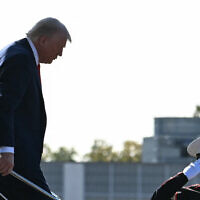 US President Donald Trump steps off Marine One as he arrives to Walter Reed National Military Medical Center to receive a medical checkup in Bethesda, Maryland, on October 10, 2025. (ANDREW CABALLERO-REYNOLDS / AFP)