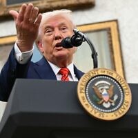 US President Donald Trump announces a deal to lower drug prices with drug maker AstraZeneca at the Oval Office of the White House in Washington, on October 10, 2025. (Saul Loeb/AFP)