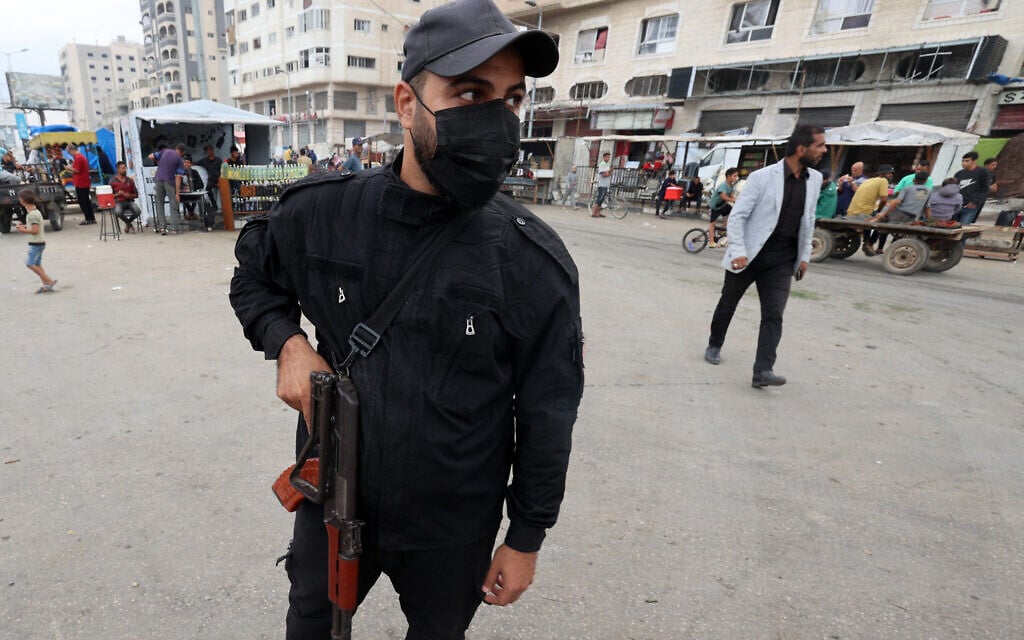 A member of the internal security forces loyal to the Palestinian terror group Hamas mans a checkpoint in the Nuseirat refugee camp in the central Gaza Strip, on October 12, 2025. (Photo by Eyad BABA / AFP) A member of the internal security forces loyal to the Palestinian terror group Hamas mans a checkpoint in the Nuseirat refugee camp in the central Gaza Strip, on October 12, 2025. (Photo by Eyad BABA / AFP)