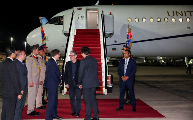 Britain's Prime Minister Keir Starmer (third from right) is greeted by UK Ambassador to Egypt Mark Bryson-Richardson in Egypt's Red Sea resort town of Sharm Al-Sheikh on October 12, 2025, ahead of a world leaders' summit on ending the Gaza war (Suzanne Plunkett / POOL / AFP)