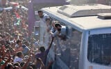 Buses carrying Gazan detainees released from Israeli prisons under a hostage and ceasefire deal arrive outside the Nasser hospital in Khan Yunis in the southern Gaza Strip on October 13, 2025. (Omar AL-QATTAA/AFP)