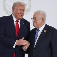 US President Donald Trump (left) greets Palestinian Authority President Mahmoud Abbas during a summit on Gaza in the Egyptian resort town of Sharm el-Sheikh on October 13, 2025. (Evan Vucci / POOL / AFP)