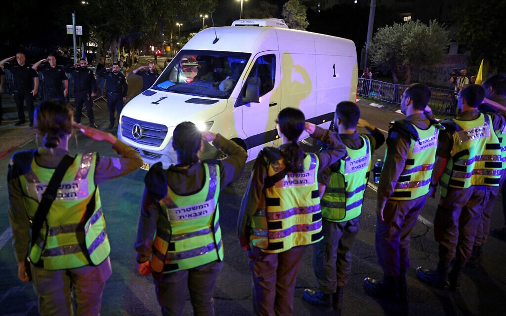 Vehicles transporting four bodies handed over following a ceasefire-hostage release deal arrive at the Abu Kabir Forensic Institute, in Tel Aviv, on October 15, 2025. (AHMAD GHARABLI / AFP)