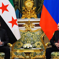 Russian President Vladimir Putin (right) and Syrian interim president Ahmed al-Sharaa hold a meeting at the Grand Kremlin Palace in Moscow on October 15, 2025. (Alexander Zemlianichenko / POOL / AFP)