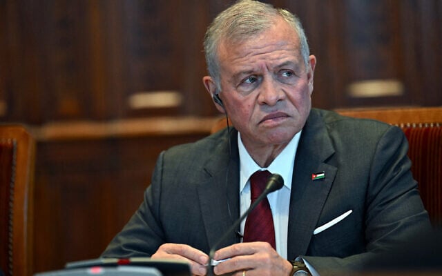 Jordan's King Abdullah II looks on during a reception by the deputy speaker of the Hungarian Parliament at the Hungarian Parliament building in Budapest on October 16, 2025 (Attila KISBENEDEK / AFP)