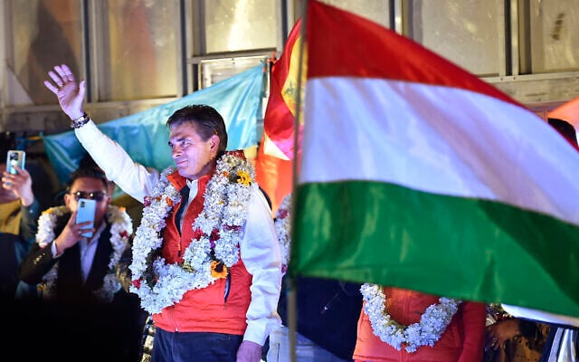 Bolivia's presidential candidate for the Christian Democratic Party (PDC), Rodrigo Paz, delivers a speech to supporters following the results of the run-off presidential election in La Paz, on October 19, 2025. (Photo by Jorge BERNAL / AFP)