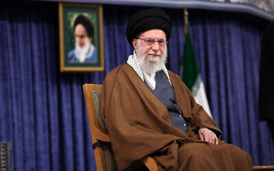 A handout picture provided by the office of Iran's Supreme Leader Ayatollah Ali Khamenei shows him addressing a meeting with local champions and medalists of sports and world science awards in Tehran on October 20, 2025. (KHAMENEI.IR / AFP)