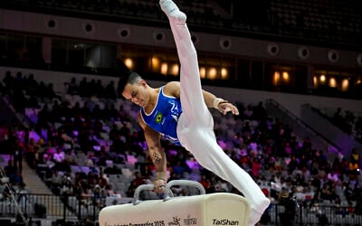 Brazil's Caio Souza competes on the pommel horse during the men's all-around final at the 53rd FIG Artistic Gymnastics World Championships in Jakarta, Indonesia, on October 22, 2025. (BAY ISMOYO / AFP)