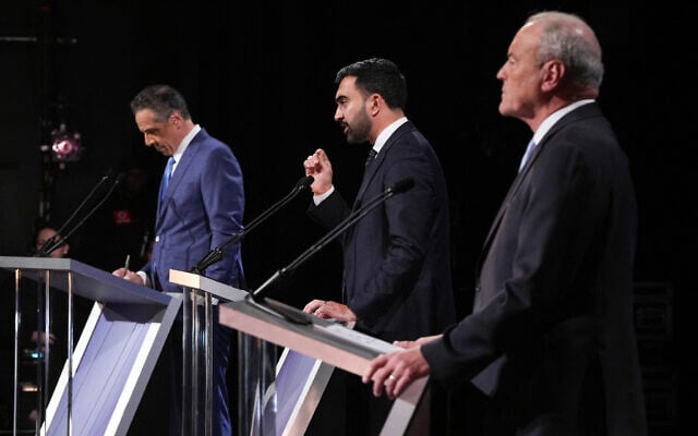 (L-R) Independent candidate and former New York Governor Andrew Cuomo, Democratic candidate Zohran Mamdani and Republican candidate Curtis Sliwa participate in the second New York City mayoral debate at LaGuardia Performing Arts Center at LaGuardia Community College in Long Island City, Queens, New York, on October 22, 2025. (Hiroko Masuike/Pool/AFP) (L-R) Independent candidate and former New York Governor Andrew Cuomo, Democratic candidate Zohran Mamdani and Republican candidate Curtis Sliwa participate in the second New York City mayoral debate at LaGuardia Performing Arts Center at LaGuardia Community College in Long Island City, Queens, New York, on October 22, 2025. (Hiroko Masuike/Pool/AFP)