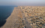 This aerial picture shows destroyed buildings in Gaza City's Al-Rimal neighborhood on October 23, 2025. (AFP)