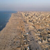 This aerial picture shows destroyed buildings in Gaza City's Al-Rimal neighborhood on October 23, 2025. (AFP)