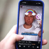 The Instagram page of MaKss Damage, a German rapper, is displayed for a photograph on a smartphone in London on October 28, 2025 (AFP)