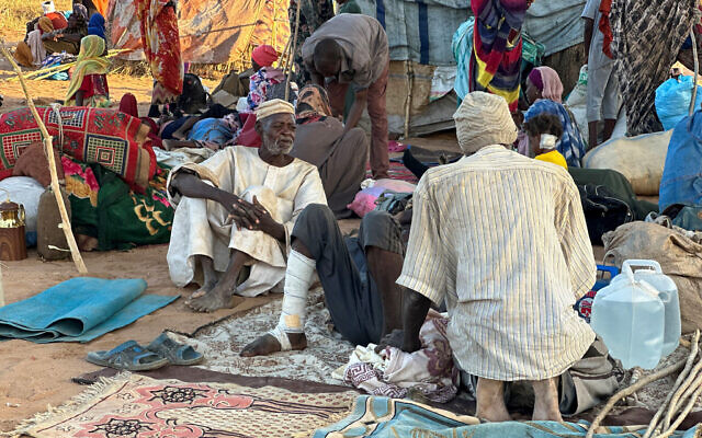 Displaced Sudanese who fled El-Fasher after the city fell to the Rapid Support Forces (RSF), rest near the town of Tawila in war-torn Sudan's western Darfur region on October 28, 2025. (AFP)