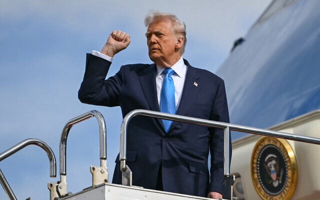 US President Donald Trump gestures as he boards Air Force One before traveling to South Korea, at Haneda Airport in Tokyo on October 29, 2025. (Andrew Caballero-Reynolds/AFP) US President Donald Trump gestures as he boards Air Force One before traveling to South Korea, at Haneda Airport in Tokyo on October 29, 2025. (Andrew Caballero-Reynolds/AFP)