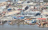 A screen grab from an aerial video shows damaged buildings and structures in St. Elizabeth Parish, Jamaica, on October 29, 2025, after Hurricane Melissa tore through the island. (AFP VIDEOGRAPHICS / AFP)