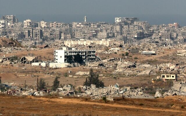 This picture taken from a position at Israel's border with the Gaza Strip shows destroyed buildings in the Palestinian territory on October 30, 2025 (Jack GUEZ / AFP)