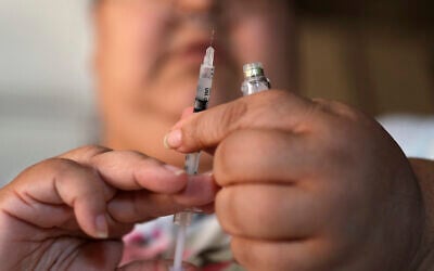 In this April 18, 2017, file photo, a woman with Type 2 diabetes prepares to inject herself with insulin at her home in Las Vegas. (AP/John Locher) In this April 18, 2017, file photo, a woman with Type 2 diabetes prepares to inject herself with insulin at her home in Las Vegas. (AP/John Locher)