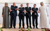 After meeting for the Negev Summit, Bahrain's Foreign Minister Abdullatif bin Rashid al-Zayani, left, Egypt's Foreign Minister Sameh Shoukry, Israel's Foreign Minister Yair Lapid, U.S. Secretary of State Antony Blinken, Morocco's Foreign Minister Nasser Bourita, and United Arab Emirates' Foreign Minister Sheikh Abdullah bin Zayed Al Nahyan, pose for a photograph Monday, March 28, 2022, in Sde Boker, Israel. (AP Photo/Jacquelyn Martin, Pool)