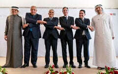 After meeting for the Negev Summit, Bahrain's Foreign Minister Abdullatif bin Rashid al-Zayani, left, Egypt's Foreign Minister Sameh Shoukry, Israel's Foreign Minister Yair Lapid, U.S. Secretary of State Antony Blinken, Morocco's Foreign Minister Nasser Bourita, and United Arab Emirates' Foreign Minister Sheikh Abdullah bin Zayed Al Nahyan, pose for a photograph Monday, March 28, 2022, in Sde Boker, Israel. (AP Photo/Jacquelyn Martin, Pool)