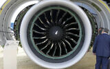 Illustrative: Visitors are interested in an airplane engine made by Pratt & Whitney at the Farnborough Air Show fair in Farnborough, England, July 18, 2022. (AP Photo/Frank Augstein)
