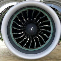 Illustrative: Visitors are interested in an airplane engine made by Pratt & Whitney at the Farnborough Air Show fair in Farnborough, England, July 18, 2022. (AP Photo/Frank Augstein)