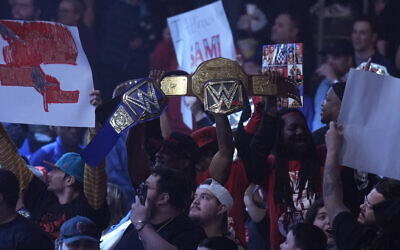 Illustrative: Professional wrestling fans during a WWE Monday Night RAW event, in Boston, Massachusetts, March 6, 2023. (AP Photo/Charles Krupa)