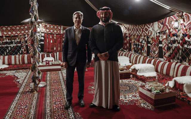 U.S. Secretary of State Antony Blinken meets with Saudi Crown Prince Mohammed bin Salman during his week-long trip aimed at calming tensions across the Middle East, in Al Ula, Saudi Arabia, Monday, Jan. 8, 2024. (Evelyn Hockstein/Pool via AP)