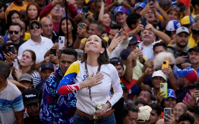 Venezuelan opposition leader Maria Corina Machado addresses supporters at a protest against President Nicolas Maduro in Caracas, Venezuela, January 9, 2025, the day before his inauguration for a third term. (AP/Ariana Cubillos)