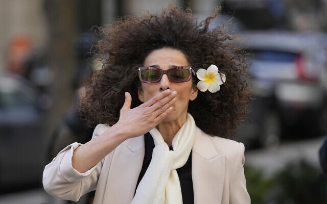 Masih Alinejad blows a kiss to supporters outside the federal courthouse after testifying at the trial of her would-be assassins in New York, March 18, 2025. (AP Photo/Seth Wenig) Masih Alinejad blows a kiss to supporters outside the federal courthouse after testifying at the trial of her would-be assassins in New York, March 18, 2025. (AP Photo/Seth Wenig)