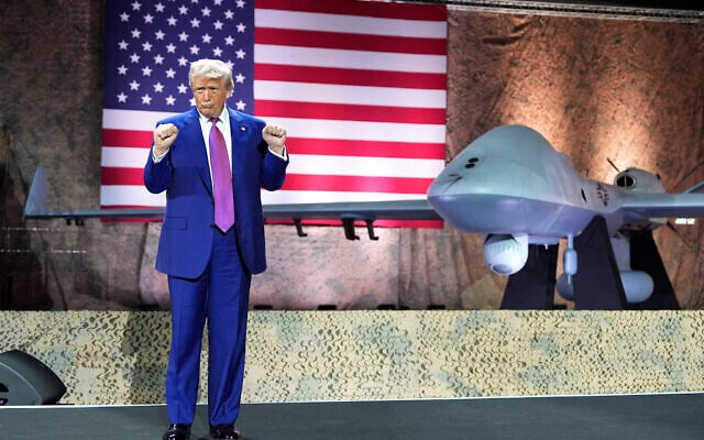 US President Donald Trump gestures backdropped by an MQ-9 Reaper drone at the Al Udeid Air Base, Thursday, May 15, 2025, in Doha, Qatar. (AP Photo/Alex Brandon) US President Donald Trump gestures backdropped by an MQ-9 Reaper drone at the Al Udeid Air Base, Thursday, May 15, 2025, in Doha, Qatar. (AP Photo/Alex Brandon)