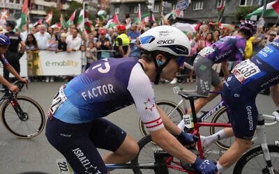 Pier-Andre Cote from the Israel Premier Tech team rides during the eleventh stage of the Spanish Vuelta cycling race, from Bilbao to Bilbao, Spain, September 3, 2025. (AP/Miguel Oses)