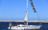 A boat that is part of the Global Sumud Flotilla departs to Gaza to deliver aid amidst Israel's blockade on the Palestinian territory, in the Tunisian port of Bizerte, September 13, 2025. (AP Photo/Anis Mili)