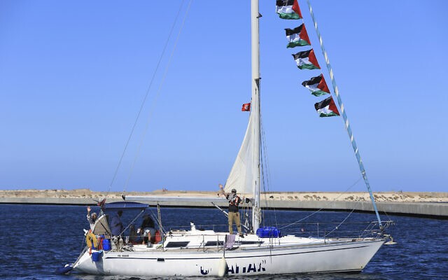 A boat that is part of the Global Sumud Flotilla departs to Gaza to deliver aid amidst Israel's blockade on the Palestinian territory, in the Tunisian port of Bizerte, September 13, 2025. (AP Photo/Anis Mili)