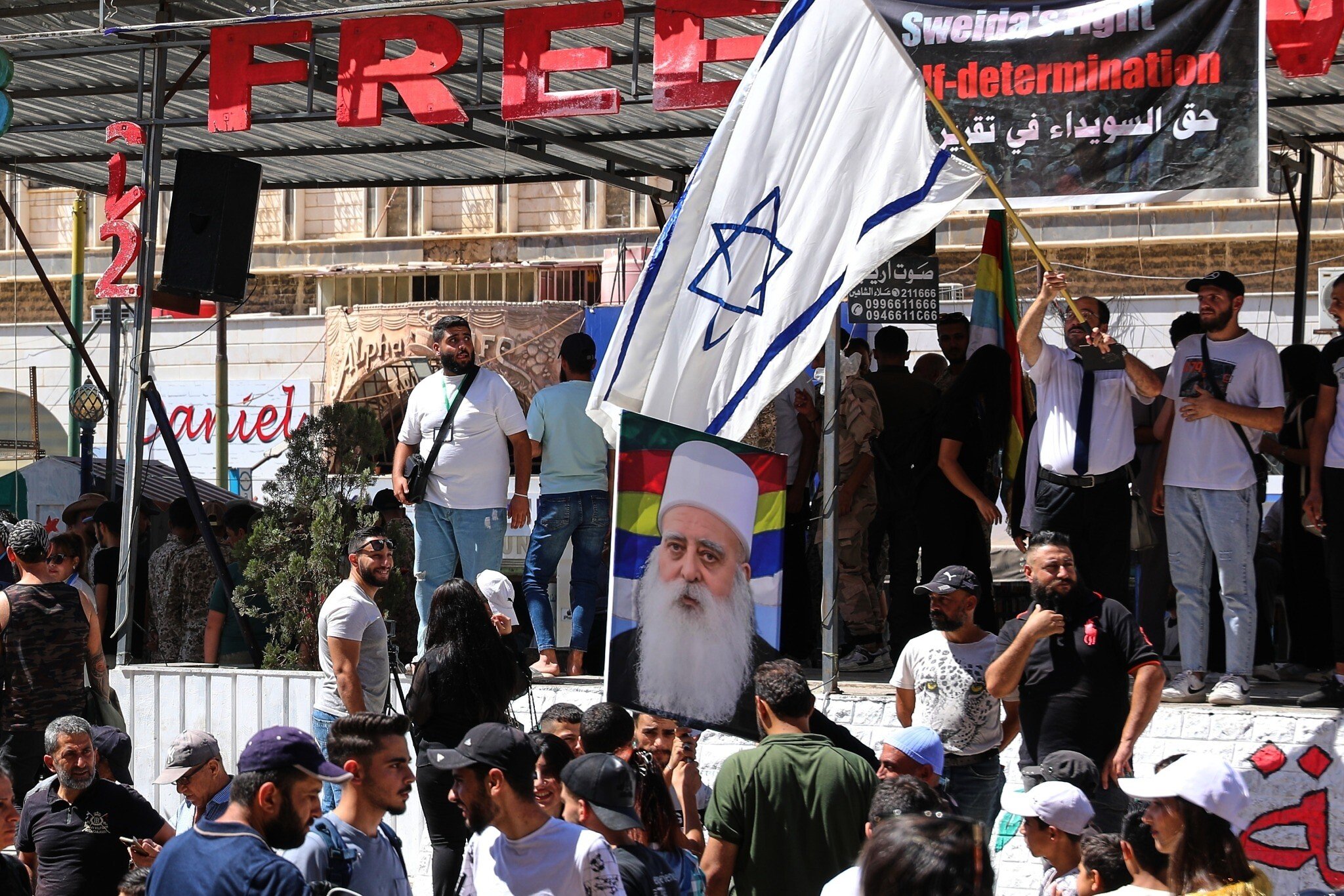 NextImg:After brutal sectarian clashes, Syrian Druze pushing for autonomy, lean toward Israel