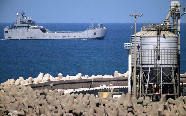 An Israeli Navy logistics support vessel moves in the Mediterranean Sea toward the port of Ashdod, October 2, 2025. (AP Photo/Leo Correa)