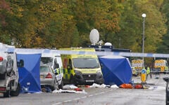 Police guard the scene of a deadly terror attack carried out a day earlier at Heaton Park Hebrew Congregation synagogue, in Crumpsall, Manchester, England, October 3, 2025. (AP Photo/Ian Hodgson)