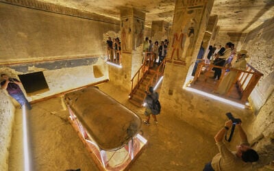 Visitors look at the tomb of Amenhotep III, who ruled ancient Egypt between 1390 BC and 1350 BC, in the Valley of Kings in the southern city of Luxor, Egypt, October 4, 2025, as it opened to visitors for the first time in more than two decades. (AP Photo/Amr Nabil)