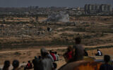 Smoke rises following Israeli shelling in central Gaza Strip, October 4, 2025.(AP Photo/Abdel Kareem Hana)