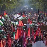 Pro-Palestinian, anti-Israel demonstrators rally during a protest in Barcelona, Spain, October 4, 2025. (AP Photo/Emilio Morenatti)