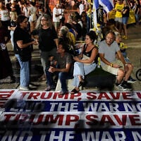 People attend a rally calling for the release of all hostages held by Hamas in the Gaza Strip and a ceasefire, in Tel Aviv, Israel, October 4, 2025. (AP Photo/Ohad Zwigenberg)